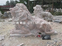 趴着的狮子雕塑晚霞红西洋狮子石雕