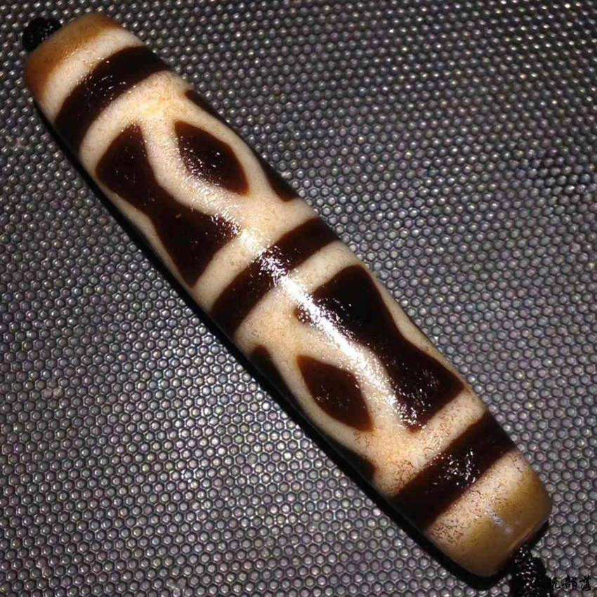 水波纹天珠快速拍卖价格高吗