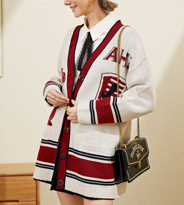 新款韩版针织开衫 云凤思儒品牌女装折扣 深圳服装库存尾货-搜了网