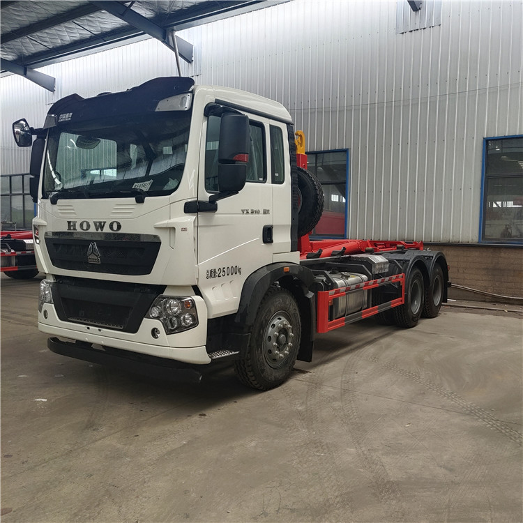 重汽豪沃25吨勾臂式自卸垃圾车 20吨装修垃圾自卸勾臂车 20吨自卸车带吊臂 